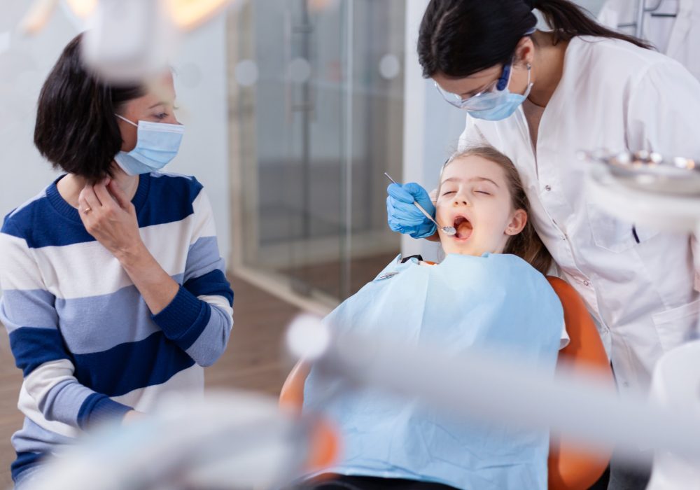 family-visit-at-dentist-office-for-dental-check-up.jpg